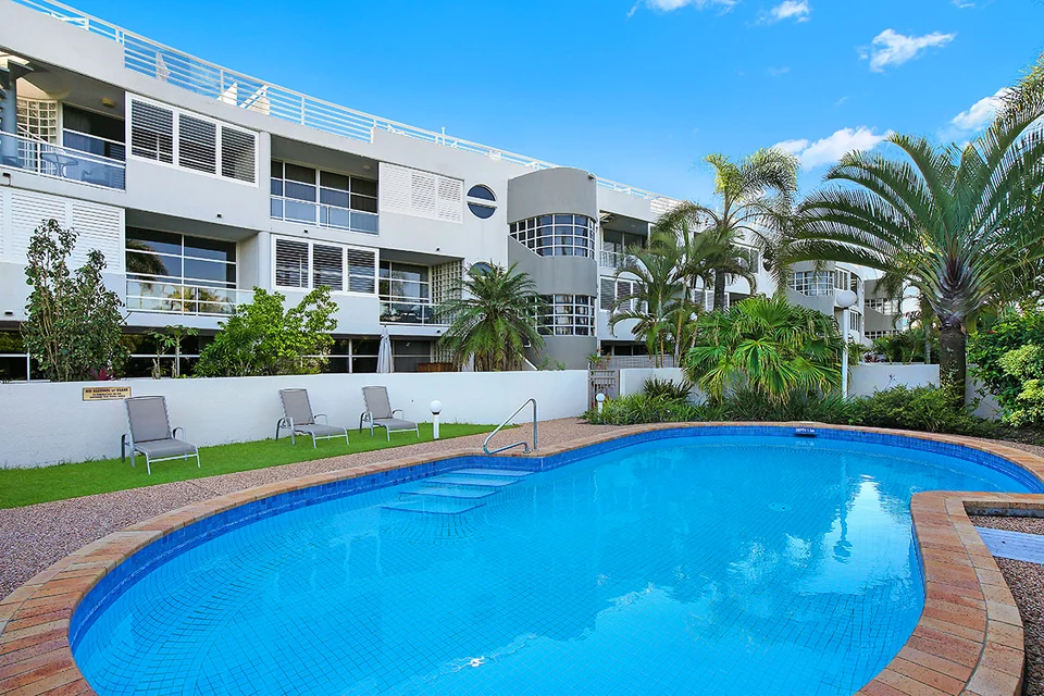The shared pool, lawn and gardens